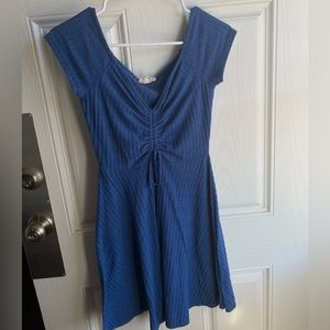 Soft blue skater dress with ruffled front by Rolla Coster